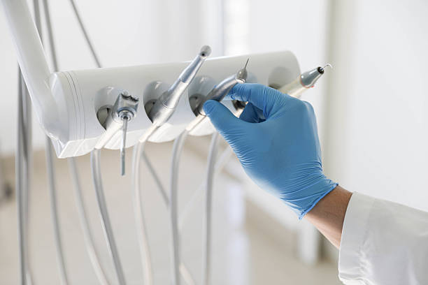 Professional Tooth Extraction technician working in Sugarmill Woods, FL